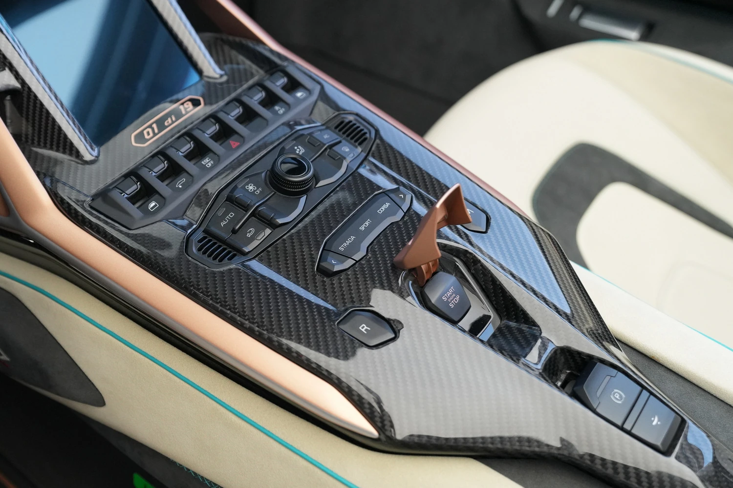 The Sian's actual carbon-fibre centre console, bronze trim and cream leather